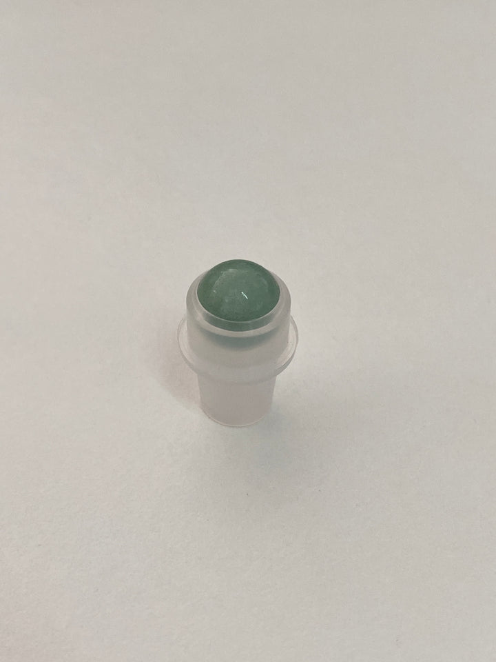 Roll-on head with crystals