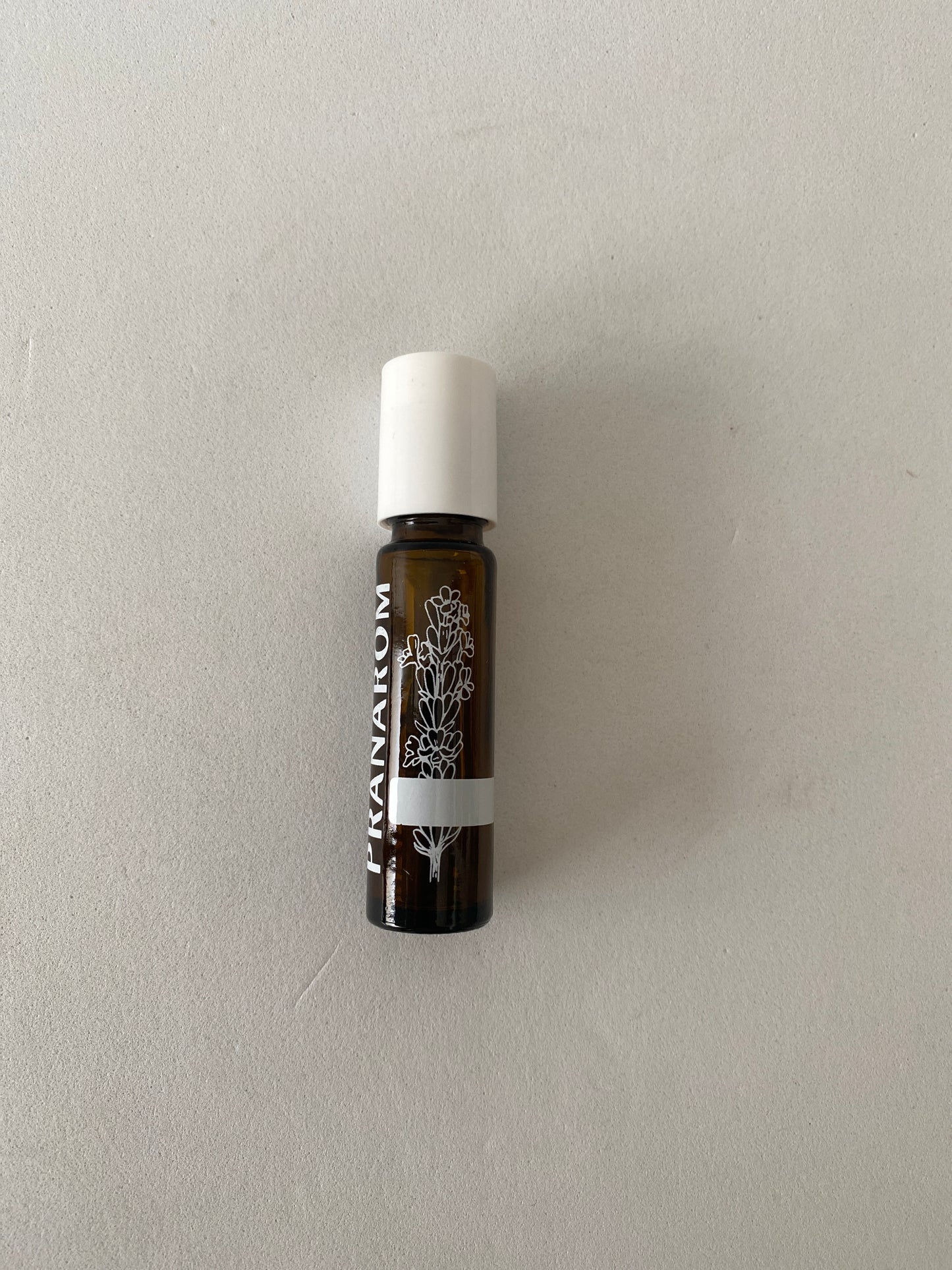 Frasco roll-on 10ml vidro ambar (esfera inox) Pranarom