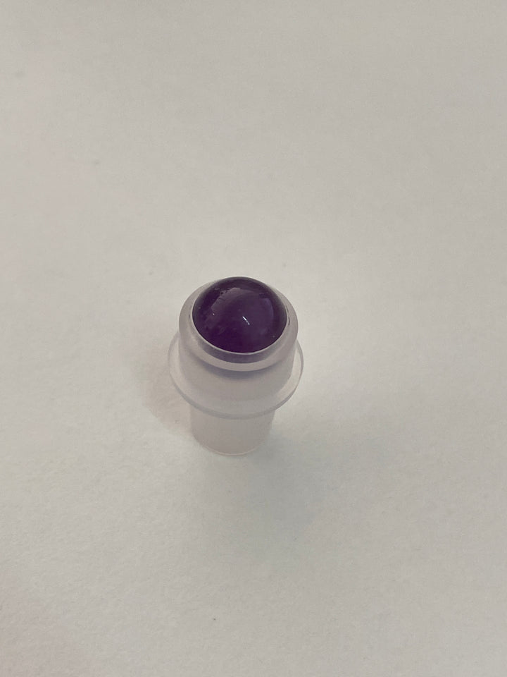 Roll-on head with crystals