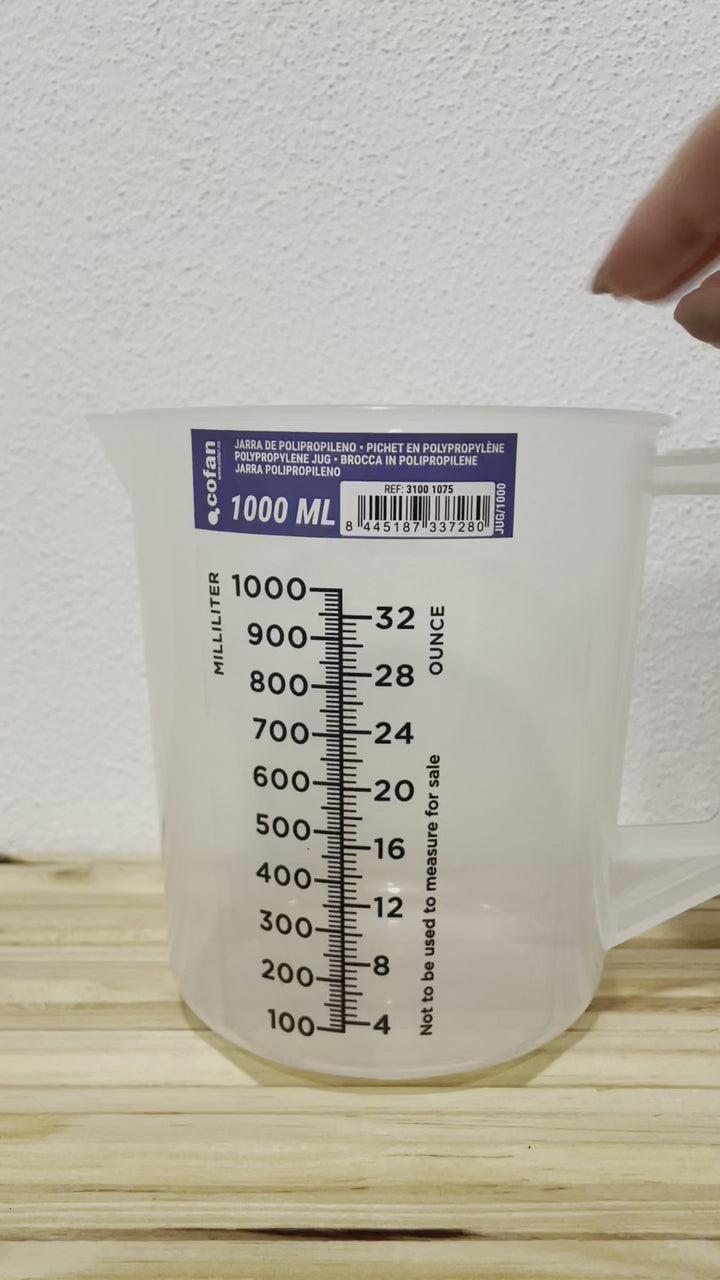 Copo Graduado (plástico forte) ***