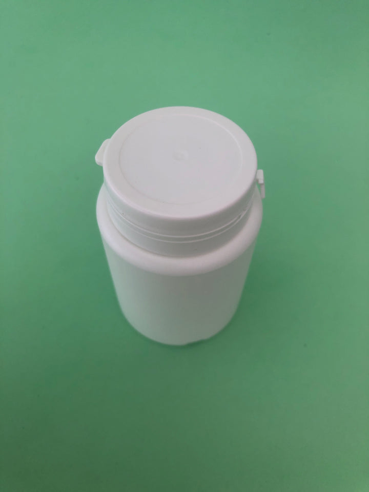 white capsule bottle