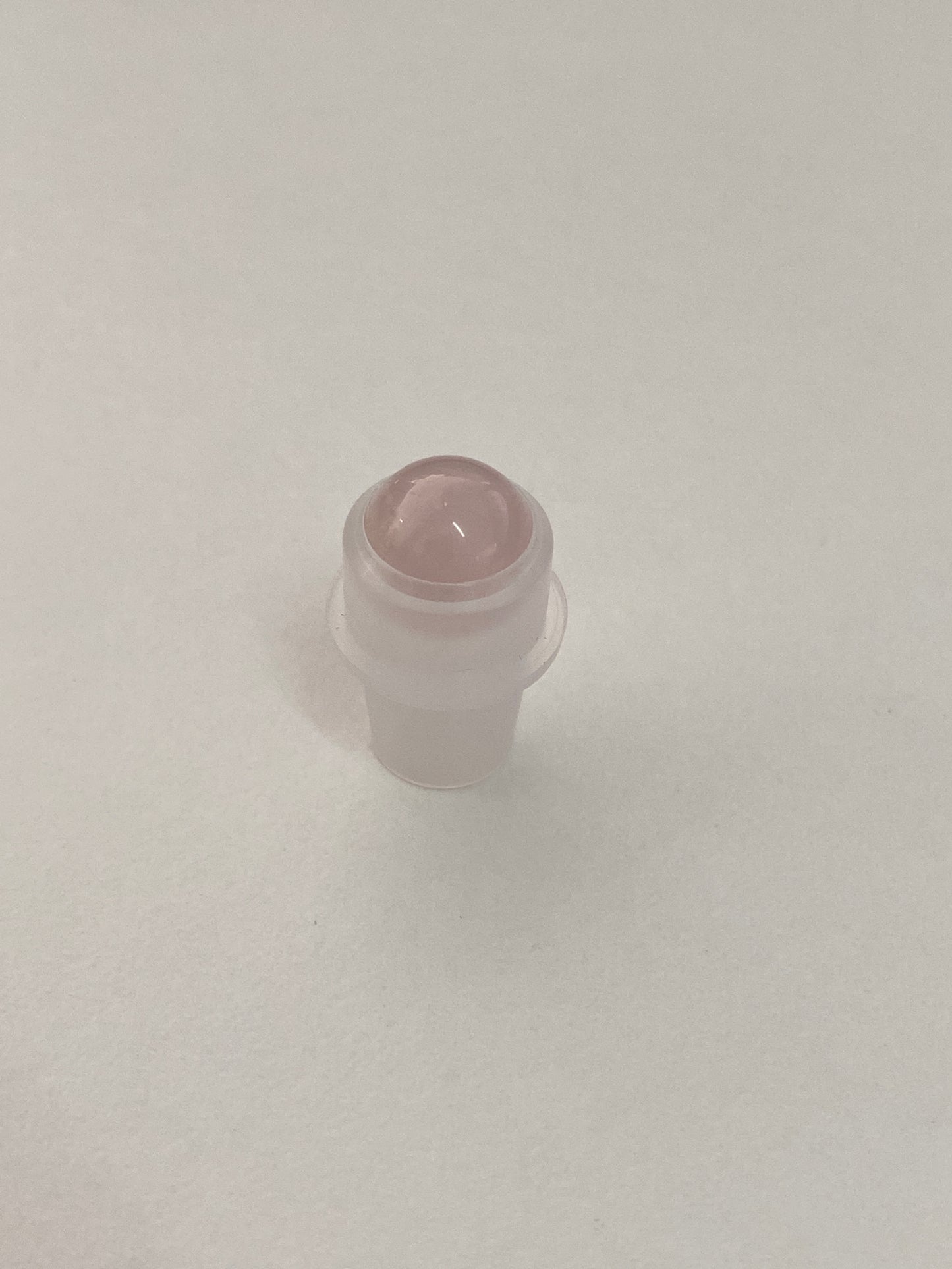 Roll-on head with crystals