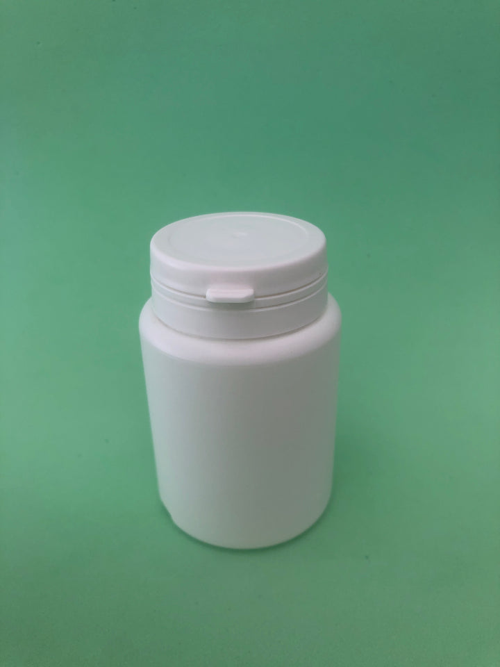 white capsule bottle