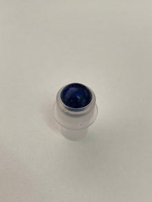 Roll-on head with crystals